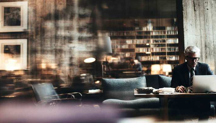 Should businesses hire professionals for trademark monitoring, or can they take a DIY approach?