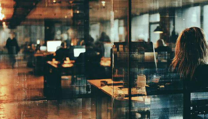 What is the importance of reviewing monitoring reports and analyzing alerts for trademark conflicts?